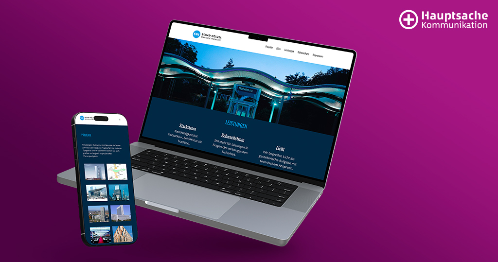 Laptop und Smartphone zeigen Website eines Ingenieurbüros vor magentafarbenem Hintergrund.